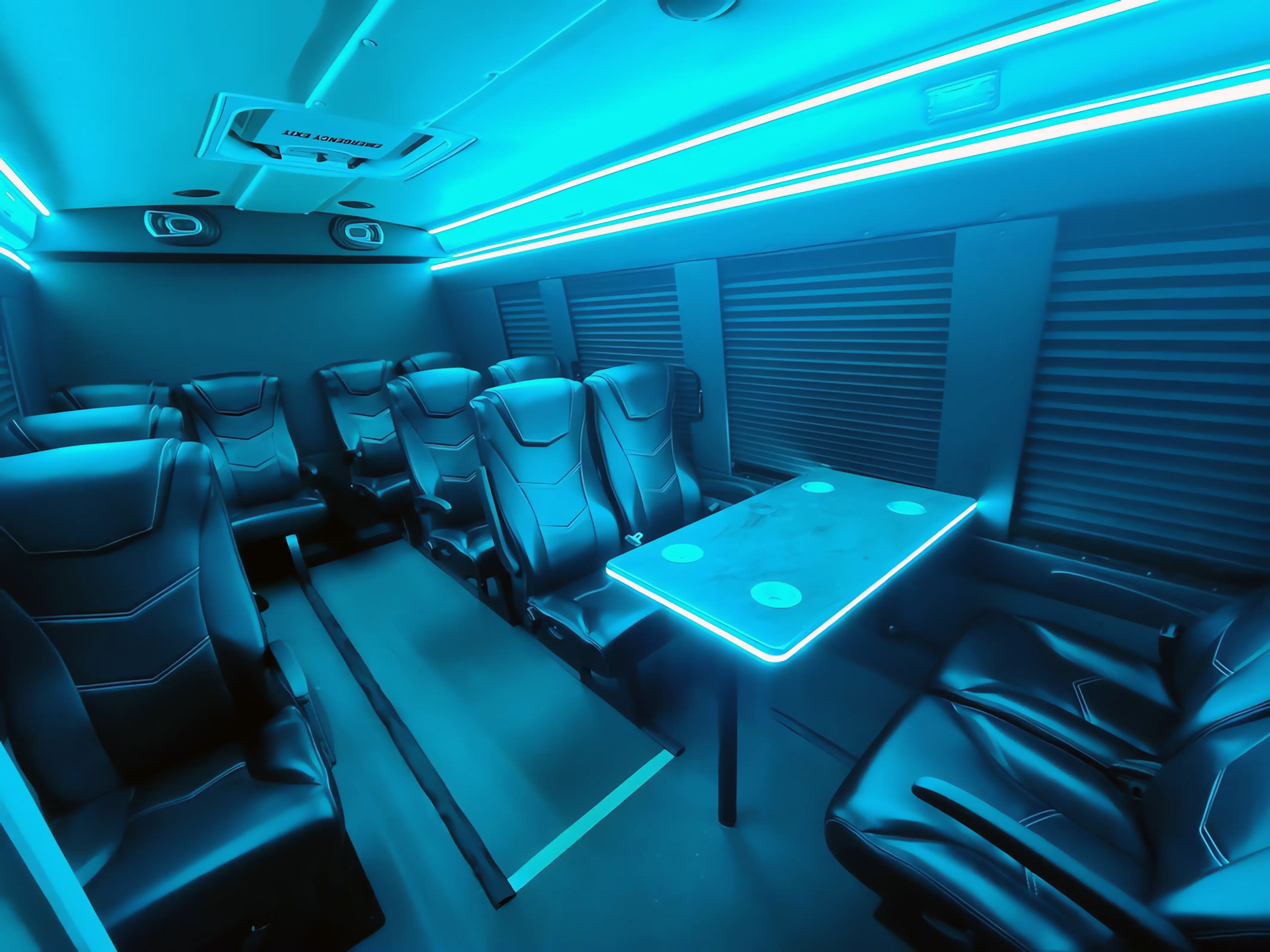 Executive transit shuttle interior teal LED lighting conference table JVS Services Cleveland Ohio